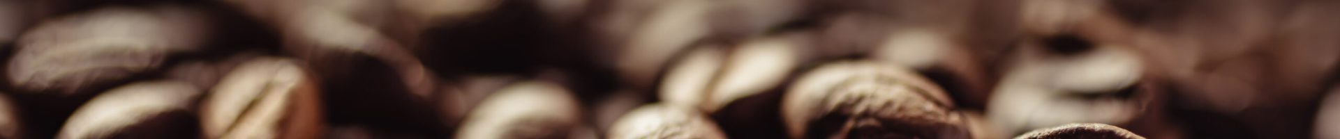 Closeup shot of coffee beans with select focus and blur background